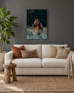 Load image into Gallery viewer, "The Still Small Voice" canvas print hanging in a cozy living room - Renegade, rescued Alpine wild horse
